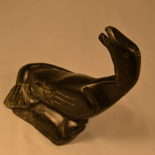 Bird with seal tail Inuit carving 1
