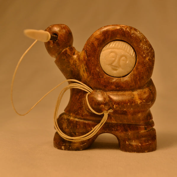 Miniature hunter with ivory face Inuit carving