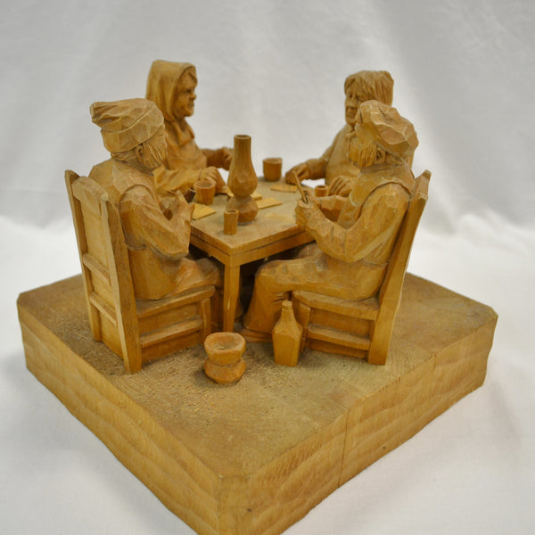 Four card players wood carving by Lucien Bourgault