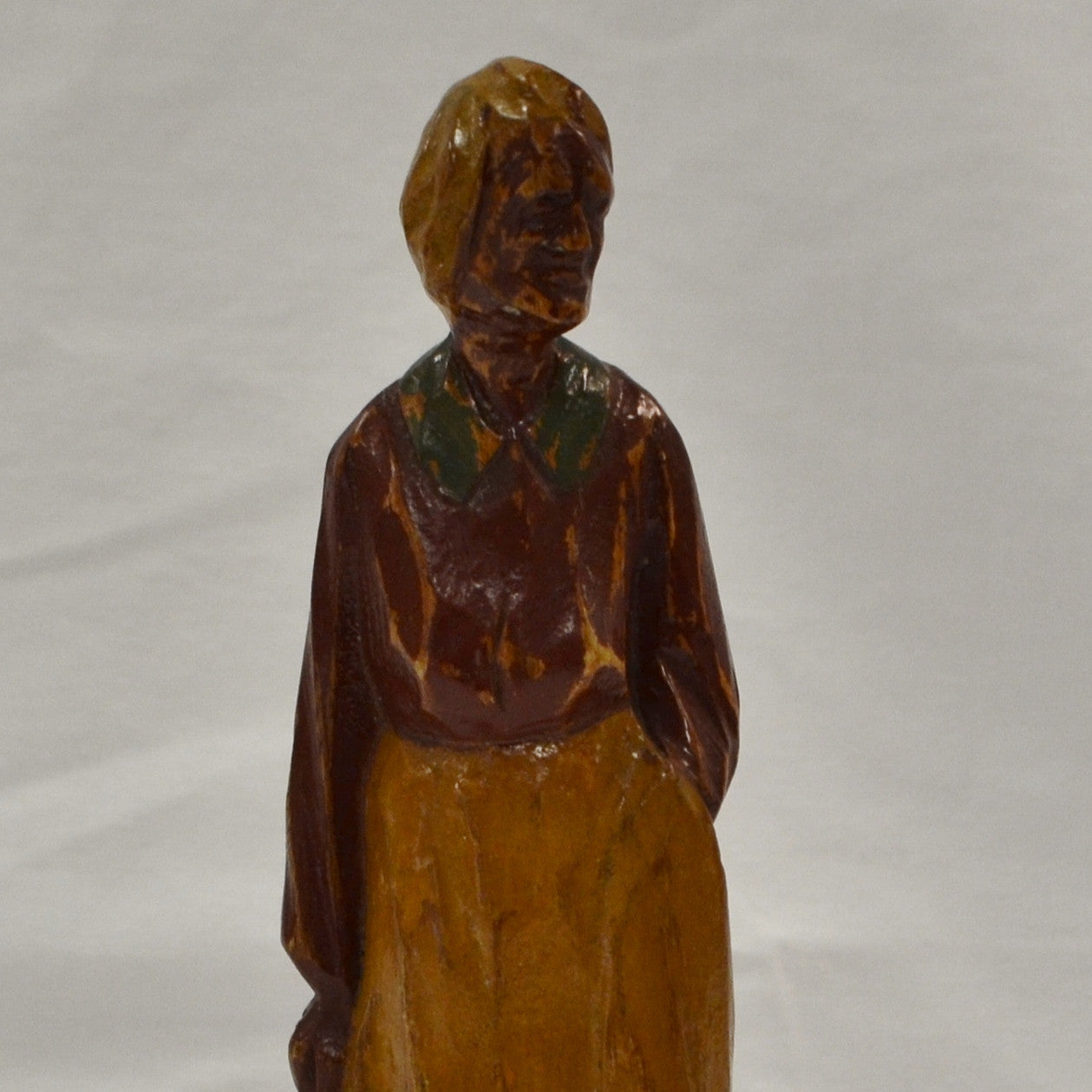 Old Woman in Red Folk Art Carving