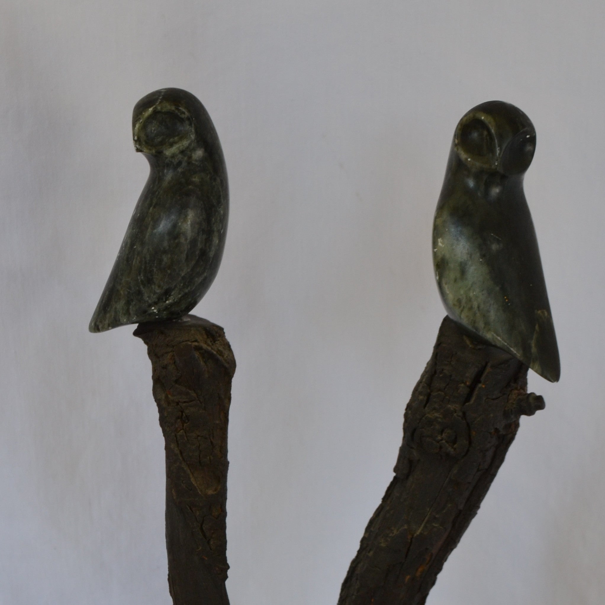 Two birds on a branch Inuit carving - close up