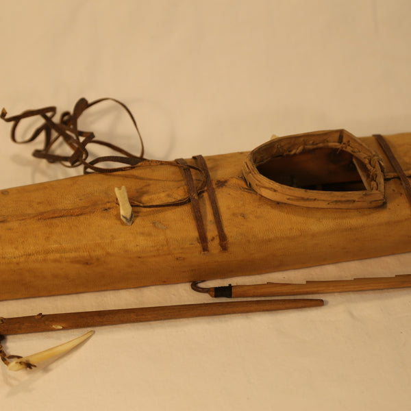 Inuit Kayak with Hunting tools